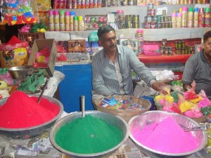 shopkeeper-selling-holi-colors